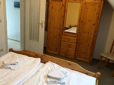 Ein Bett oder Betten in einem Zimmer der Unterkunft -