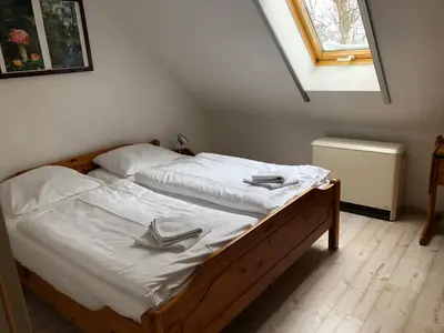Ein Bett oder Betten in einem Zimmer der Unterkunft -