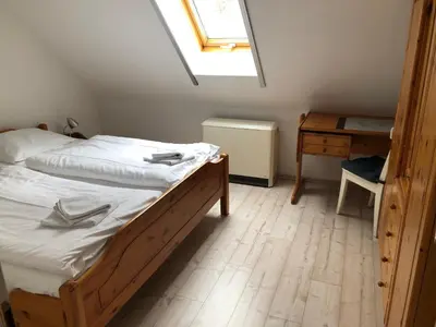 Ein Bett oder Betten in einem Zimmer der Unterkunft -