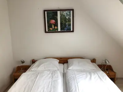 Ein Bett oder Betten in einem Zimmer der Unterkunft -