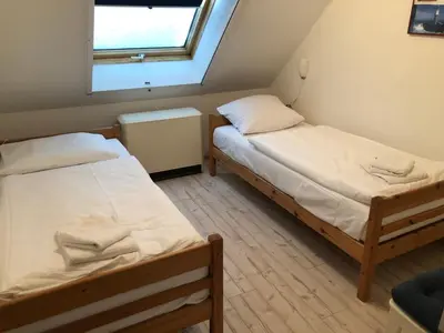 Ein Bett oder Betten in einem Zimmer der Unterkunft -