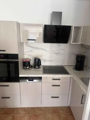 Küche/Küchenzeile in der Unterkunft Apartment in Pruchten 41178
