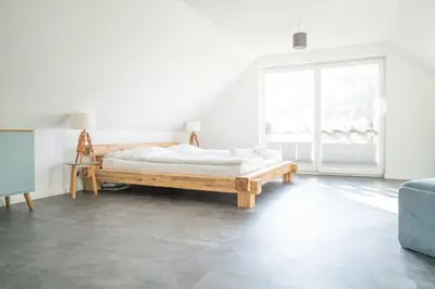 Ein Bett oder Betten in einem Zimmer der Unterkunft Haus Dinis