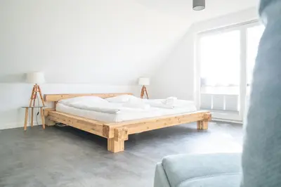 Ein Bett oder Betten in einem Zimmer der Unterkunft Haus Dinis