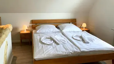 Ein Bett oder Betten in einem Zimmer der Unterkunft Hexenhaus Kessel