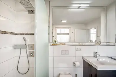 Ein Badezimmer in der Unterkunft Küstenliebe 01