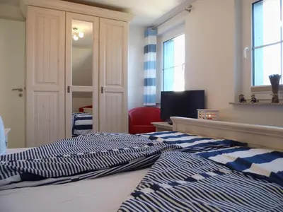 Ein Bett oder Betten in einem Zimmer der Unterkunft Captain's Lounge
