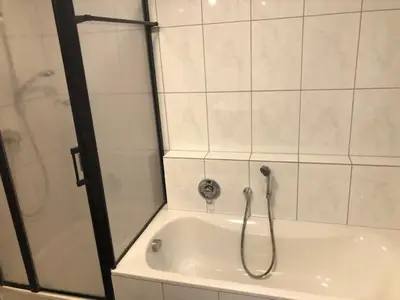Ein Badezimmer in der Unterkunft 