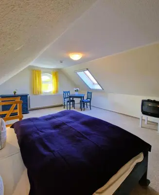 Ein Bett oder Betten in einem Zimmer der Unterkunft 