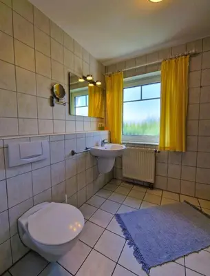 Ein Badezimmer in der Unterkunft 