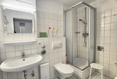 Ein Badezimmer in der Unterkunft Achtern Diek 4b FW 3