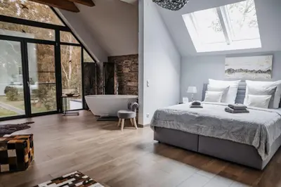 Ein Bett oder Betten in einem Zimmer der Unterkunft Uns Langhus