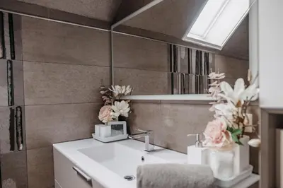 Ein Badezimmer in der Unterkunft Uns Langhus