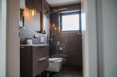 Ein Badezimmer in der Unterkunft Uns Langhus