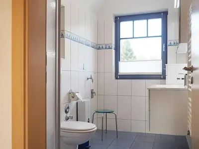 Ein Badezimmer in der Unterkunft Kormoran - W3