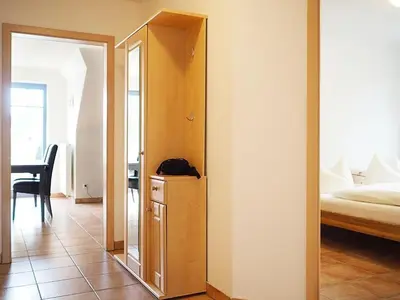 Ein Bett oder Betten in einem Zimmer der Unterkunft Kormoran - W3