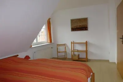 Ein Bett oder Betten in einem Zimmer der Unterkunft DHH 4 