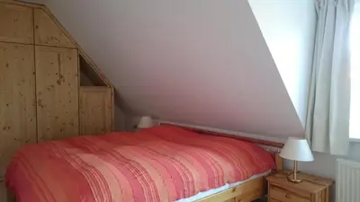 Ein Bett oder Betten in einem Zimmer der Unterkunft DHH 4 