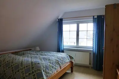 Ein Bett oder Betten in einem Zimmer der Unterkunft DHH 4 