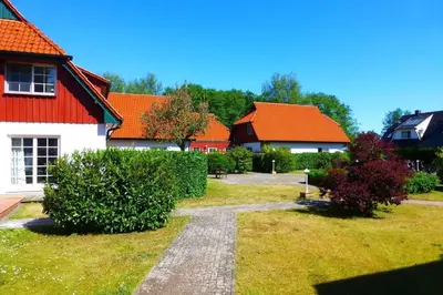 Ein Garten an der Unterkunft DHH 4 