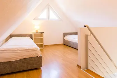 Ein Bett oder Betten in einem Zimmer der Unterkunft Strandleben 10 - Louis Douzette