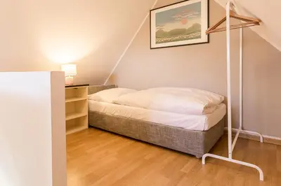 Ein Bett oder Betten in einem Zimmer der Unterkunft Strandleben 10 - Louis Douzette