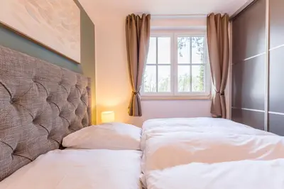 Ein Bett oder Betten in einem Zimmer der Unterkunft Strandleben 11 - Hans Kinder