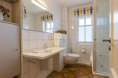 Ein Badezimmer in der Unterkunft Achtern Diek