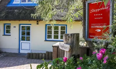 Ein Garten an der Unterkunft Skipperhus