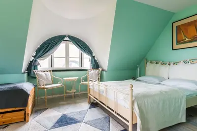 Ein Bett oder Betten in einem Zimmer der Unterkunft Drömhus