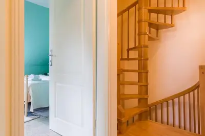 Ein Bett oder Betten in einem Zimmer der Unterkunft Drömhus