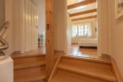 Ein Bett oder Betten in einem Zimmer der Unterkunft Künstlerhaus Rosenthal 02