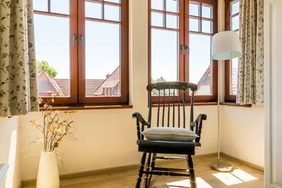 Ein Sitzbereich in der Unterkunft Nele Nelsson Hus, Landhaus Haven Höövt