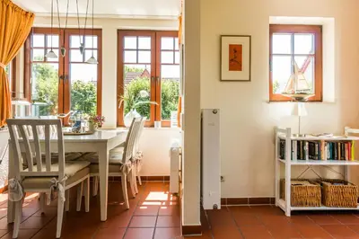 Ein Sitzbereich in der Unterkunft Nele Nelsson Hus, Landhaus Haven Höövt