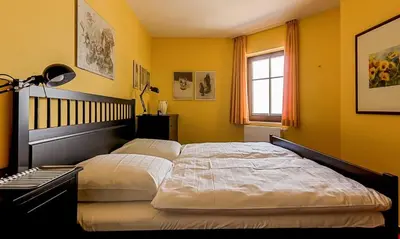Ein Bett oder Betten in einem Zimmer der Unterkunft Bootsanleger, Landhaus Haven Höövt