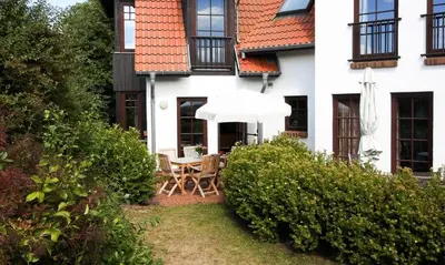 Ein Garten an der Unterkunft Windflüchter, Landhaus Haven Höövt