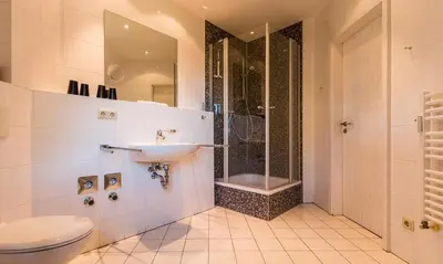 Ein Badezimmer in der Unterkunft Windflüchter, Landhaus Haven Höövt