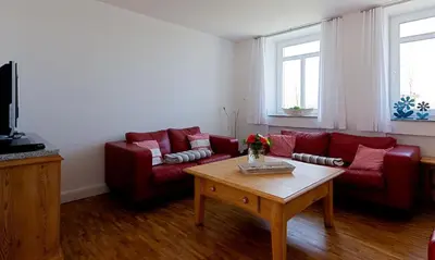 Ein Sitzbereich in der Unterkunft Kapitänshaus - Kajüte