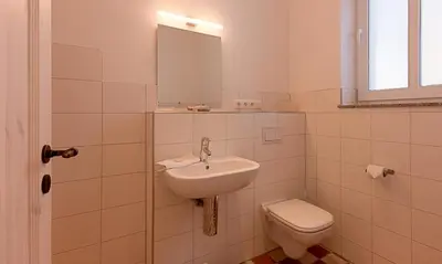 Ein Badezimmer in der Unterkunft Kapitänshaus - Atelier