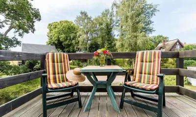 Ein Garten an der Unterkunft Schifferhus