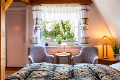 Ein Bett oder Betten in einem Zimmer der Unterkunft Schifferhus