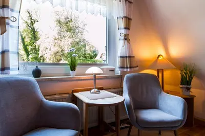 Ein Sitzbereich in der Unterkunft Schifferhus