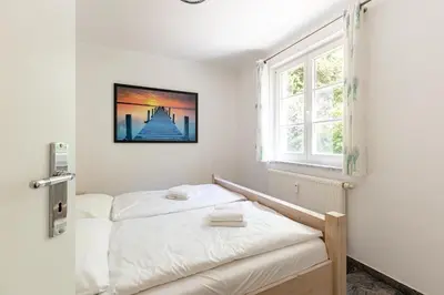 Ein Bett oder Betten in einem Zimmer der Unterkunft Schifferstübchen
