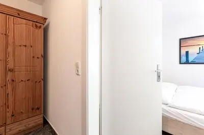 Ein Bett oder Betten in einem Zimmer der Unterkunft Schifferstübchen