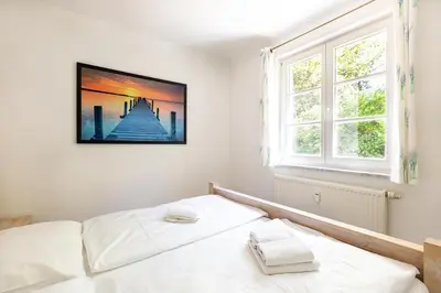 Ein Bett oder Betten in einem Zimmer der Unterkunft Schifferstübchen