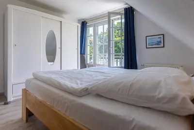 Ein Bett oder Betten in einem Zimmer der Unterkunft Wiesenblick