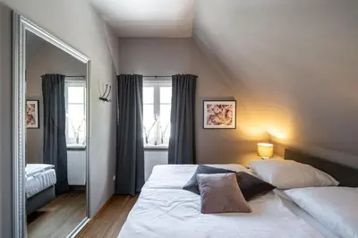 Ein Bett oder Betten in einem Zimmer der Unterkunft Atelierwohnung Paul Müller-Kaempff