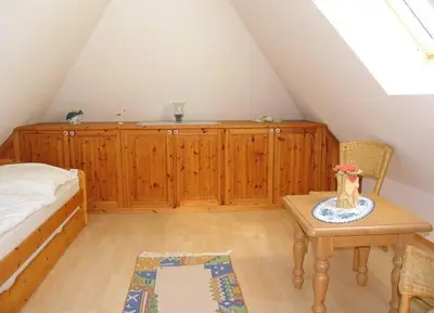 Ein Bett oder Betten in einem Zimmer der Unterkunft Seebär