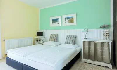 Ein Bett oder Betten in einem Zimmer der Unterkunft Marikens Deel