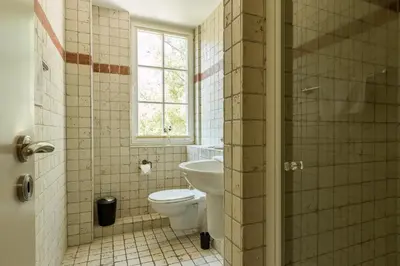 Ein Badezimmer in der Unterkunft Mädesüß 02
